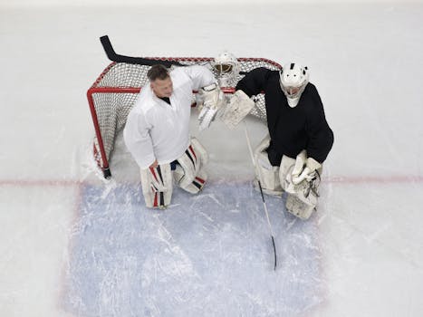 hockey players practicing slap shots